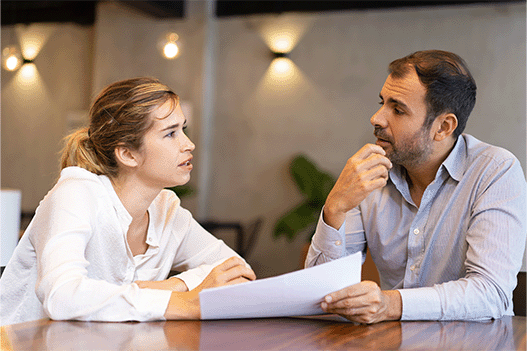 man and women chatting during an interview
